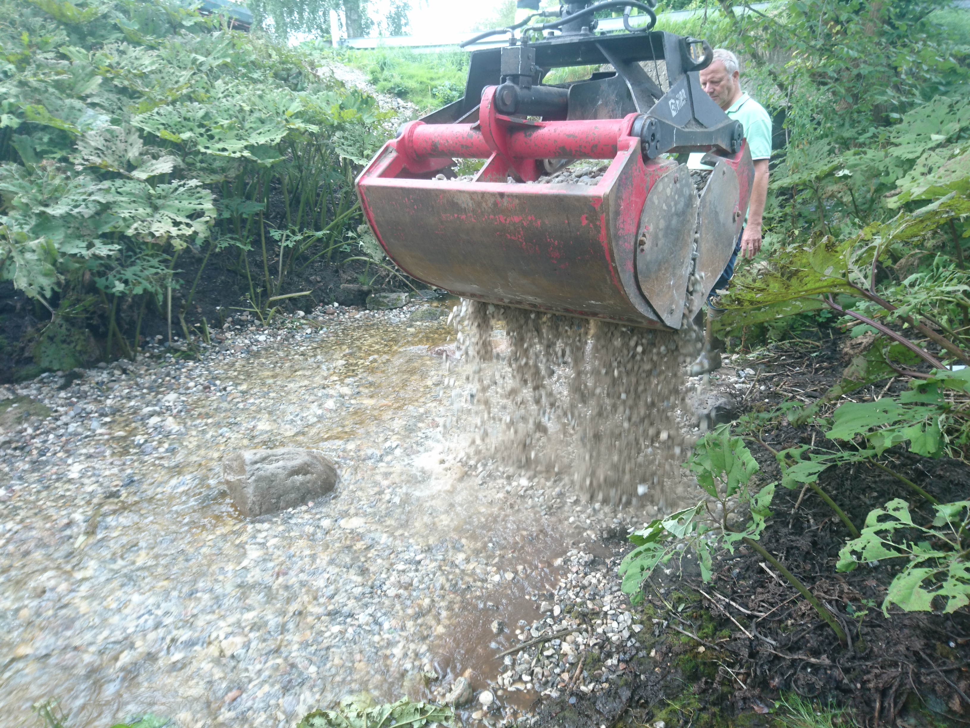 The river bed level is raised by adding coarse substratum to the stream bottom. Photo: NIRAS